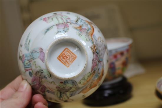 Three 18th century Chinese family rose tea bowls and two saucers, two other teabowls and three wood stands